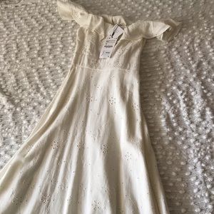Brand new Zara mid length off the shoulder dress.